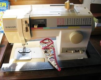 Singer sewing machine BUY IT NOW $ 85.00