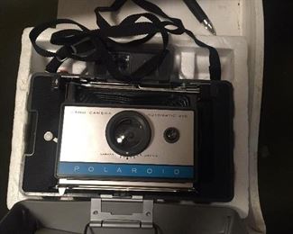 Polaroid land camera and flash