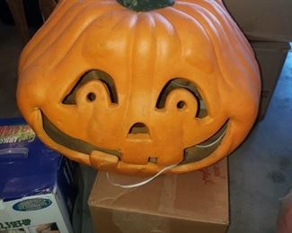 Blow mold Jack-O-Lantern plugs in.