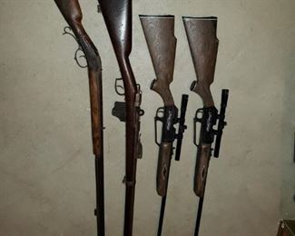2 antique long rifles, one is in working condition, the other is wall art; 2 air rifles