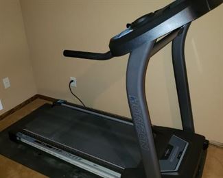 Treadmill - brand new never used. Folds and rolls for easy storage.