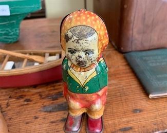 antique tin wind up toy