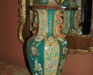 One of pair of lidded English ironstone urns