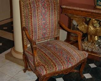 French hand-carved walnut chair with custom fabric