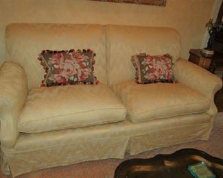 Two place sofa covered by the Queen's upholsterer