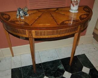 One of several demilune tables