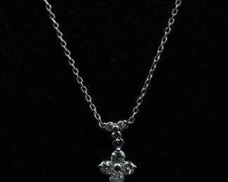 Platinum Flower Style diamond pendant .36 carat total weight with pleat chain