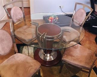 Modern style glass, chrome and suede round table and chairs