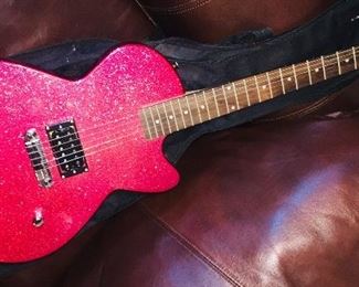 Hot pink electric guitar