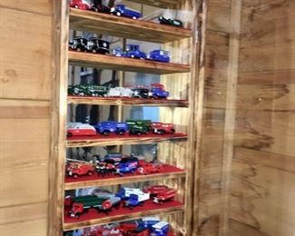 mirrored display case with great die cast collection