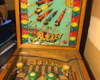 Stand up vintage pinball machine in great condition. Mfg. Milwaukee. Have the key.  The strip you see in the image is the cord to plug it in. Fantastic piece!