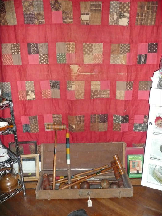 C. 1920 handmade croquet set and antique red and blue quilt