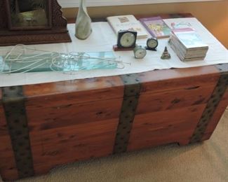 Cedar Chest- large cedar chest with wheels and metal banding, inside has removable box