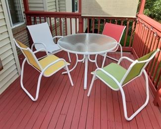 Color patio set with 6 chairs only for showing here plus two matching recliners