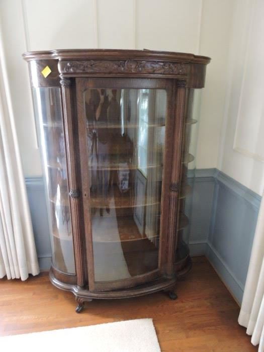 Bow front Bent Glass curio Cabinet with ornate fret work