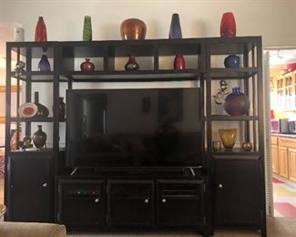 Vizio T V, Entertainment Center,
Various Pottery, and Art Glass