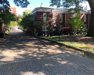 This is what the townhouse looks like. The entrance will be from the garage in the back. Just follow the signs down the driveway and turn right. Nothing on any of the patios will be for sale. Please be respectful of our neighbors and stay off the patios. Please do not block the driveways.