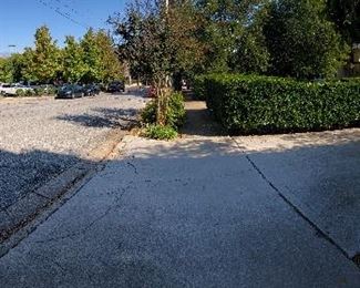 This is the entrance to the townhouse. Please park on Lindsey Street or across of E 4th Street. There is a small parking lot at the townhouse. This parking lot will be for handicap parking and loading only.