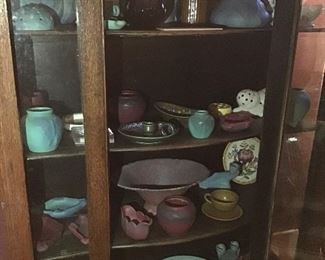 Van Briggle Pottery, and lots of other potteries. Oak Display Cabinet