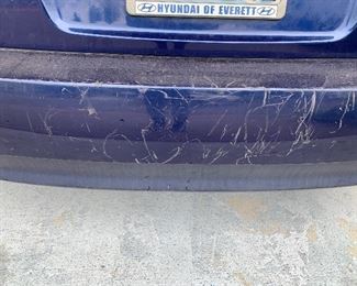 Note scratches on the bumper. The car does need a solid cleaning inside and out. 