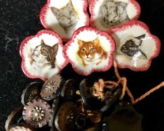 Porcelain cat buttons and buttons