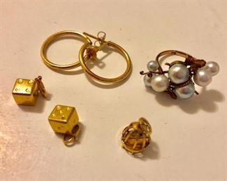 Dice charms, birdcage charm, gold hoops, pearl ring