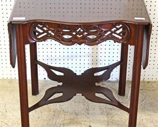  SOLID “Baker Furniture” Mahogany Chippendale Drop Side Lamp Table by Baker

Auction Estimate $300-$600 – Located Inside

  