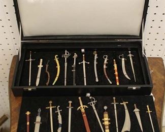  Set of 24 Miniature Swords in Case

Auction Estimate $50-$150 – Located Glassware 