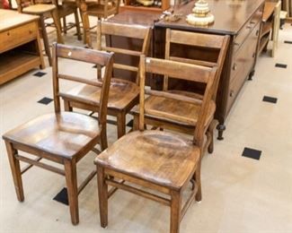 Several wood chairs...