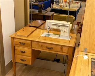 Several sewing machines in this sale!