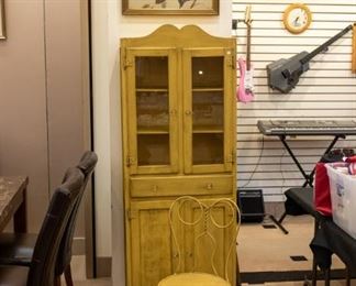 What an adorable cabinet! The vintage bird picture is nice too:)