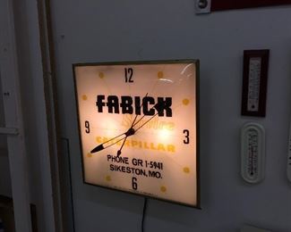 Vintage Fabick Caterpillar advertiseing clock.