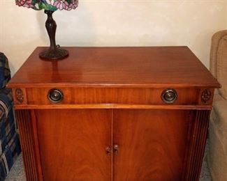 Incredible expanding table in cabinet, see next photo...