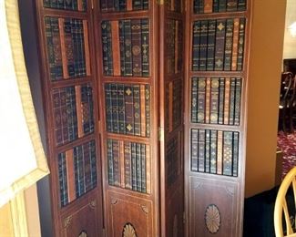 Terrific library room divider (with actual inlayed book spines)