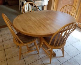 Solid wood kitchen table and four chairs