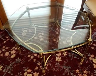 Glass and brass coffee table