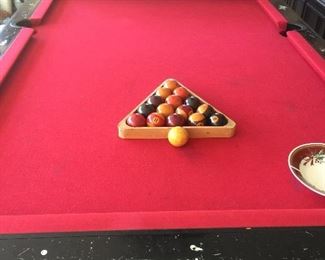 The pool balls are a little yellowed with time in this set but that is what makes then cool.