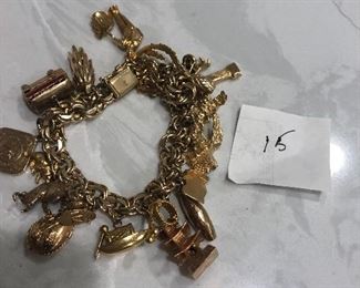 Very large and heavy 14k charm bracelet $5,000, a few pieces are 9k