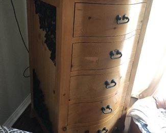 Bowed front dresser with metal work on the side $400