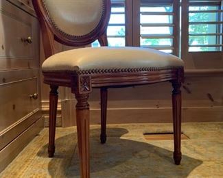 Round Back Leather Accent Chair with Carved Frame and Nail Head Detail