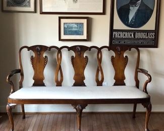 Antique bench with white textured upholstery