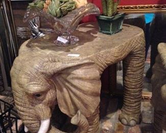 One of two elephant side tables