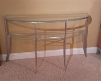 Sturdy glass sofa/entryway table on polished aluminum base, with coffee table.