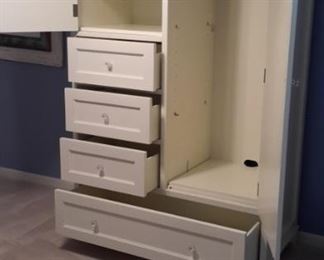 Pottery Barn armoire with tons of storage.