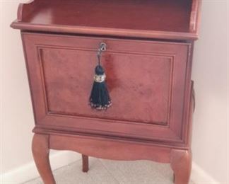 Adorable antique telephone table.