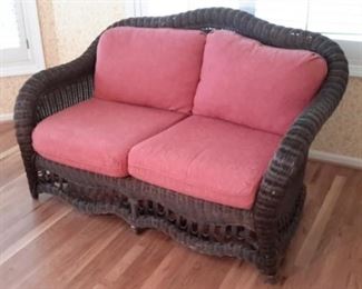Very nice black painted wicker love seat with matching wicker arm chair, in great condition!