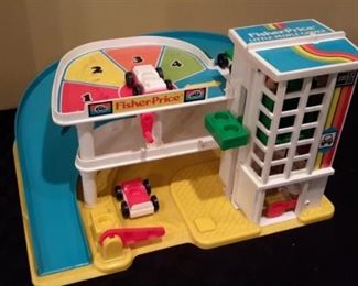 Fisher-Price Little People Garage with 3 cars. All parts work!