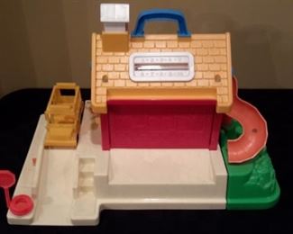 Fisher-Price Little People School House with bus. Pull-out playground with equipment.