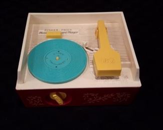 Fisher-Price Music Box and Record Player with all 5 original records. Works great!!