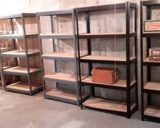 5 metal and wood storage shelves.